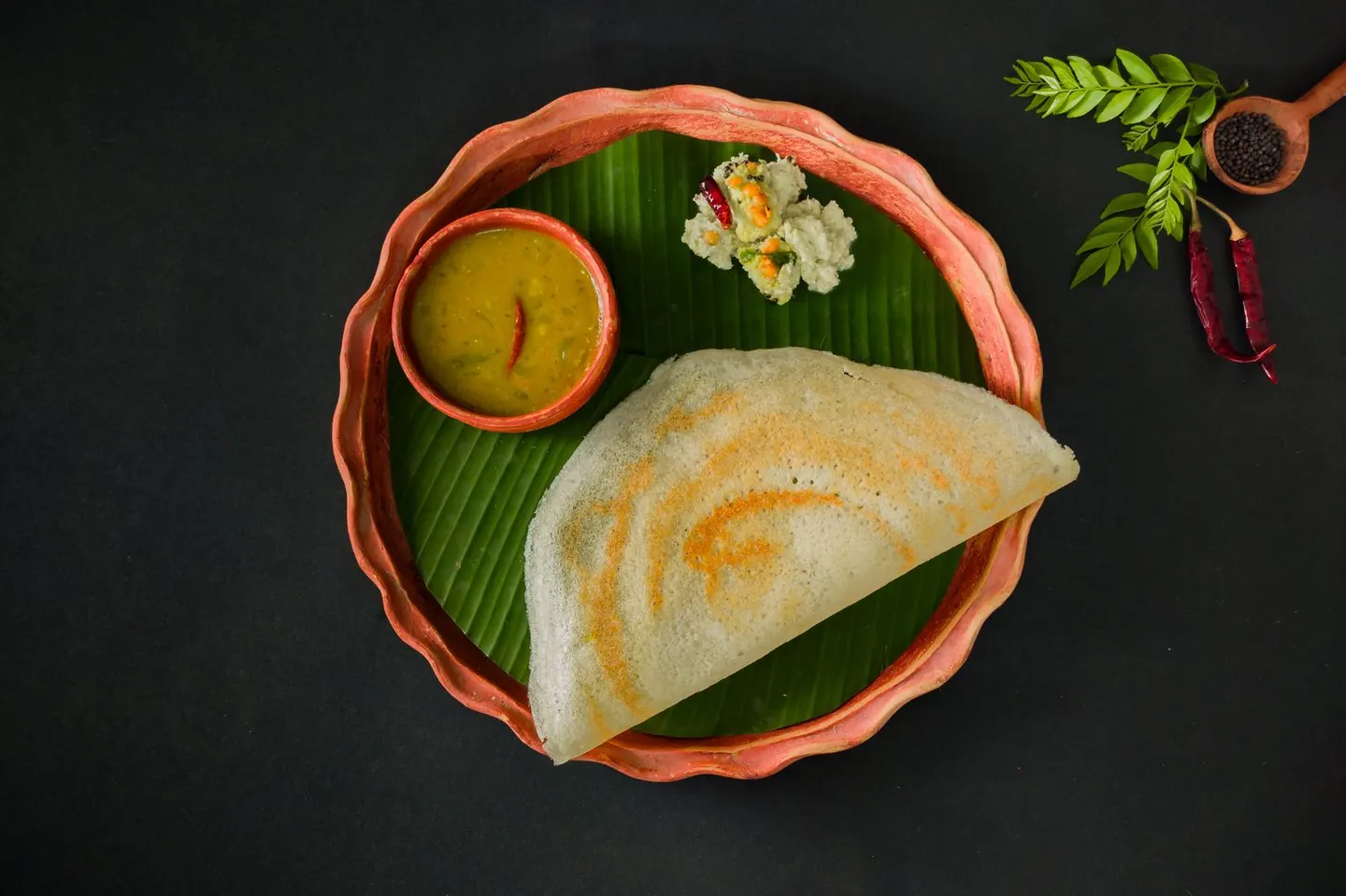 Masala dosa on a banana leaf
