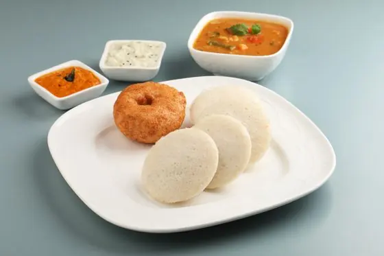 Idli and vada with sambar and chutney